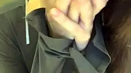 The pregnant woman pulls her milky tits out of her red bra