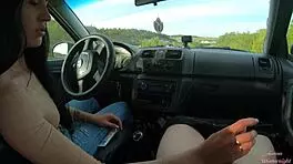 Teen brunette gets public car handjob from big cock friend