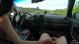 Teen brunette gets public car handjob from big cock friend