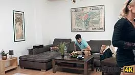 Mature cleaning lady seduces young lover in stockings