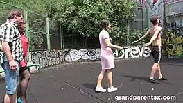 Elderly Couple Picks Up Teen On Basketball Court