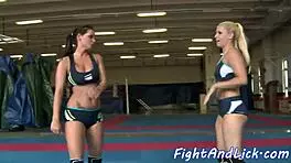 Can you handle a tattooed babe wrestling with a lovely teen?