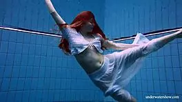 Redhead in White Dress, Pool Fun?