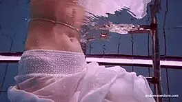 Redhead in White Dress, Pool Fun?