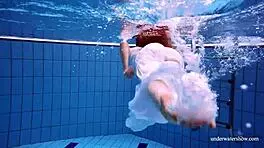 Redhead in White Dress, Pool Fun?