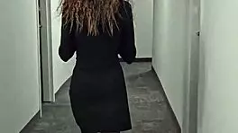 A Young Brunette Poetess Reads Poetry in Dress