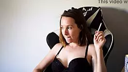 Busty Brunette Smoking In Black Bra