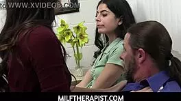 Sexy MILF doctor Ashley Wolf helps slutty babe learn to share her old man