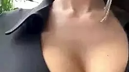 Stepmother with big boobs walks outside