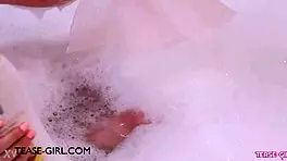 enchanting brunette muse enjoys a sensual bath