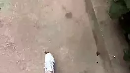 Stepmother with big boobs walks outside