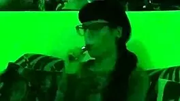 Beth kinky sexy goth domina smoking in green light