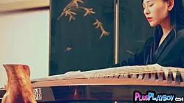 Chinese model posing session and striptease for playboy