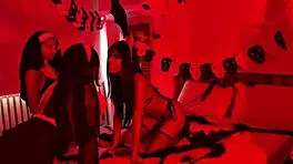 halloween lesbian party with a devil, nuns, and witch kissing