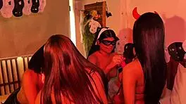 halloween lesbian party with a devil, nuns, and witch kissing