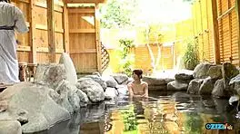 asian babe with big tits milks guy in pool?