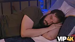 In a european villa, a young brunette latina seduces an older man on the sofa with passionate kisses and intimate touches