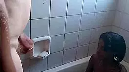 in the bathroom, she gives a passionate blowjob
