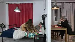 Young Woman Seduces Older Man In Kitchen