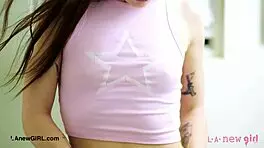 Beautiful brunette enjoys effortless shower routine with petite charm