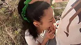 Young cocksucker gulps massive load behind garages