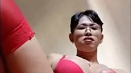watch this ladyboy stroke red bra til explosive cum?