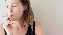 Petite Brunette Teases Smoking with Blue Eyes Voyeur