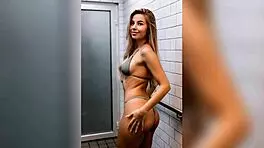 check out this 40 year old blonde bouncing her cute ass in the bathroom dance