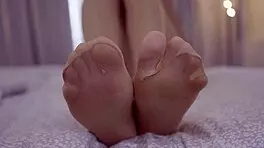 sexy blonde teases feet in nylons craving your hot load