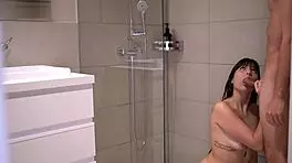couple enjoys steamy shower sex together