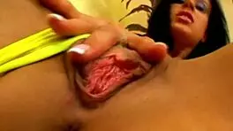 hey watch this horny brunette masturbate her shaved pussy in thong