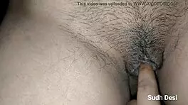 desi woman fingers her pussy deeply with a pen inside