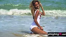 Check out this smoking Ukrainian blonde teen posing nude on the beach!