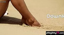 Check out this smoking Ukrainian blonde teen posing nude on the beach!