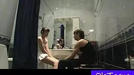 two blondes enjoy steamy bath fun in homemade video