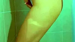 College stunner slips off Brazilian thong in steamy shower tease