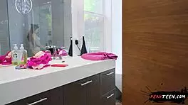 Voyeur spies on bikini babe bathing in steamy shower