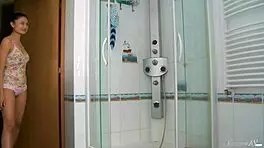 Brunette teen 18+ Lucilla rubs clit under shower stream