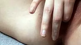 Watch this tight young british teen finger her wet pussy moaning hard