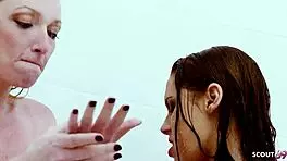 tanned milf saggy natural tits bushy vagina seduces pale blonde to shower lesbian licking