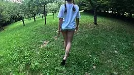 perfect brunette babe rips clothes naked in forest striptease woods!