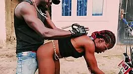 Petite biker babe stands on bike taking hard public garage fuck from man!