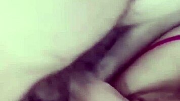 girlfriend on the balcony teases by playing with her wet pussy