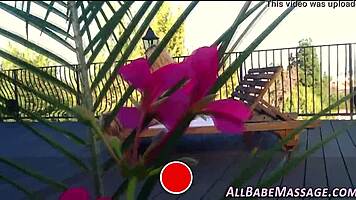 Lesbian watches as masseuse pleasures her client