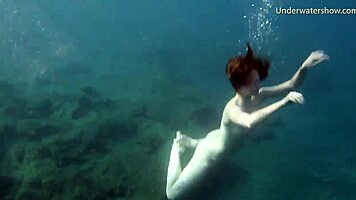 In Tenerife, Hot Ginger Teen 18+ Swims Underwater, Showing Off Bikini in Public Pool Scene
